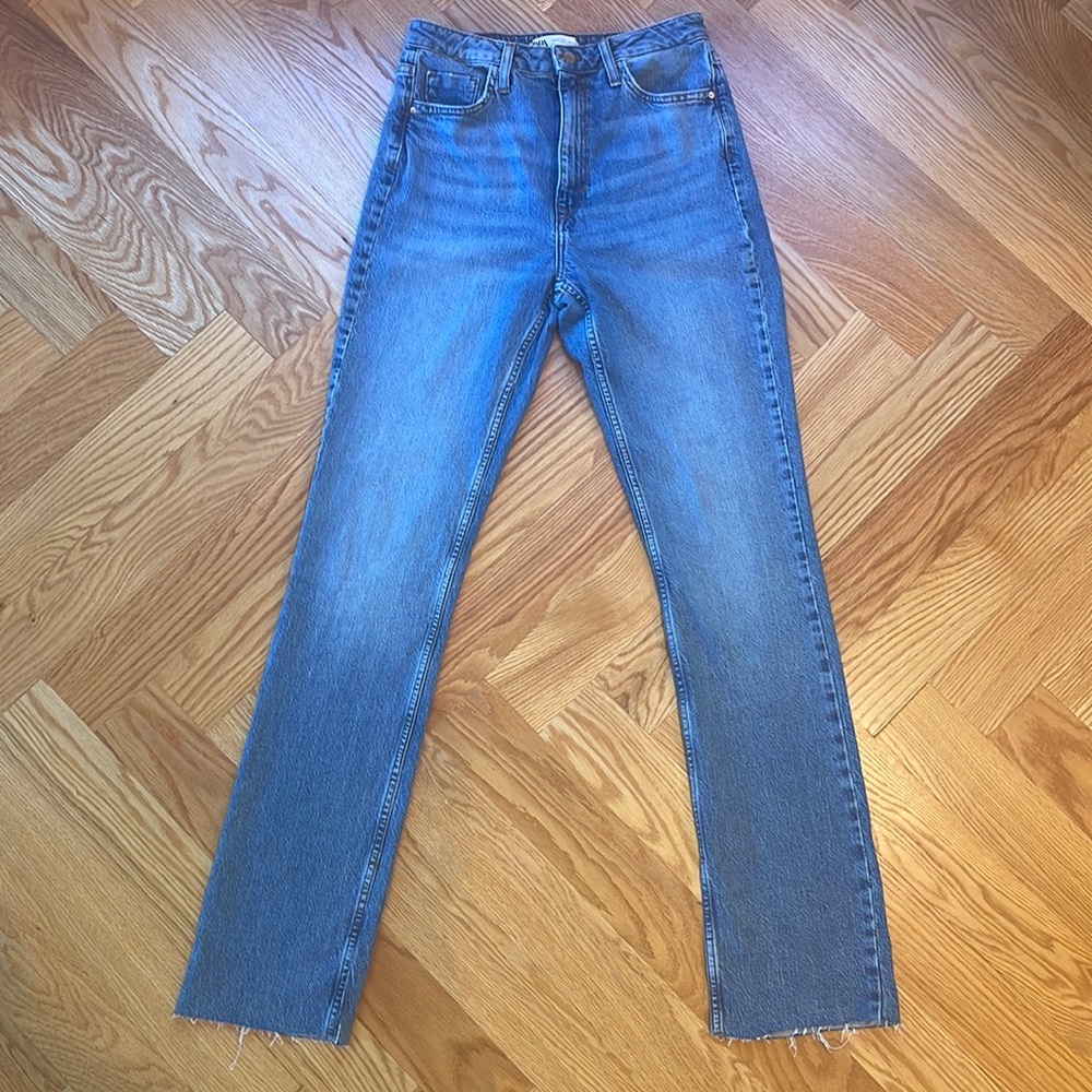 Light blue, high-waisted jeans with slits at the inseam from Zara, size 4